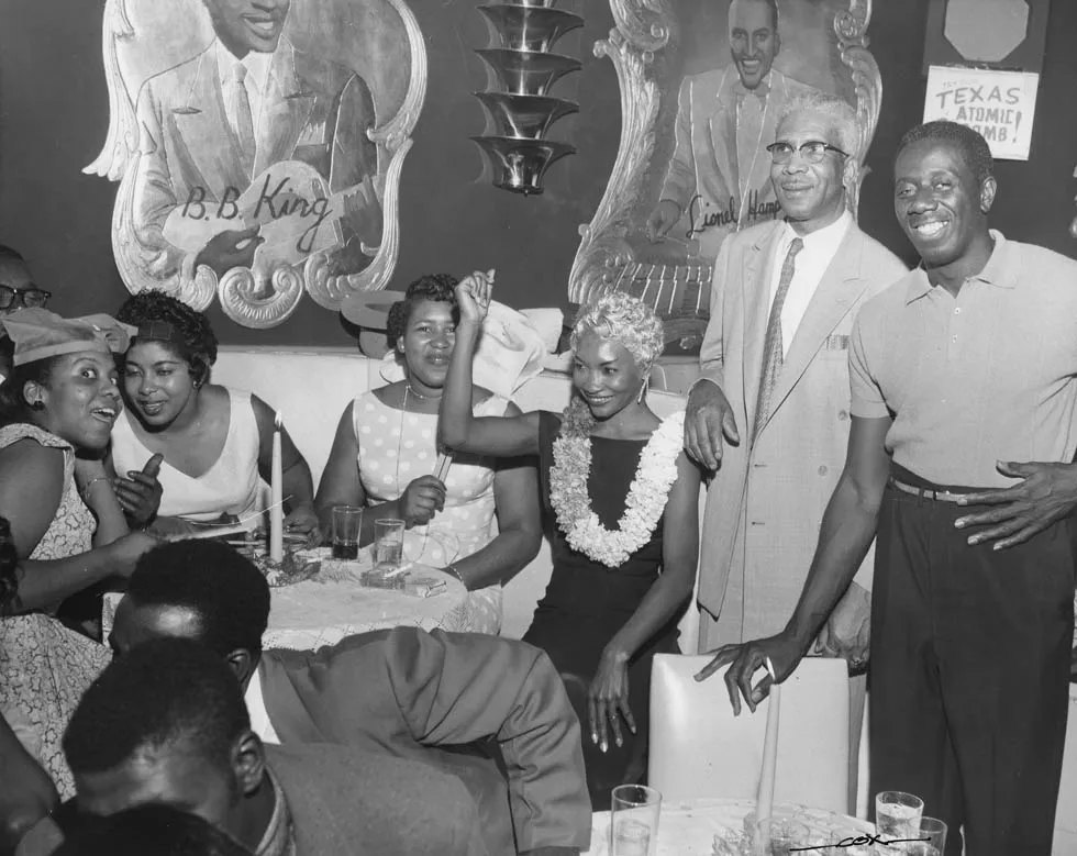 Lottie “The Body” Claiborne and Goose Tatum at a party at the Texas Playhouse, early 1950s